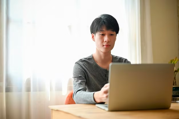 person on computer